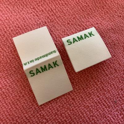 China Sustainable Custom Neat Taffeta Woven Logo Label , Soft Apparel Suits Label For Boutique for sale