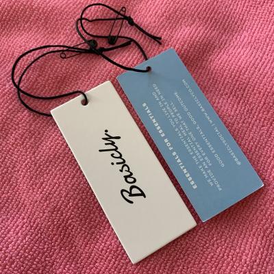 China Viable Matte Outdoor Sheer White Paper Swing Label , Apparel Brand Logo Hang Tag With String Tag for sale