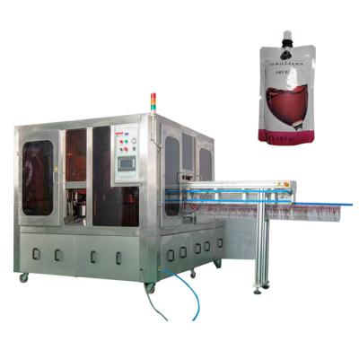 China APPAREL spout pouch filling capping machine/stand up pouch with spout filling machine/stand up pouch filling and sealing machine for sale