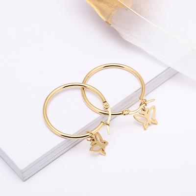 China Trendy Accessories 18k Romantic Gold Women Circle Drop Jewelry Gold Stainless Steel Hollow Hoop Earring for sale