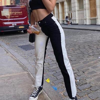 China Streetwear fashion women QUICK DRY jeans black straight asymmetric women jeans patchwork white women jeans for sale