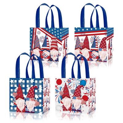 China Xindeli Recyclable WFF018 4th Of July Nonwoven Bags With Handles Candy Tote Gift Bags For American Independence Day Party Supplies for sale