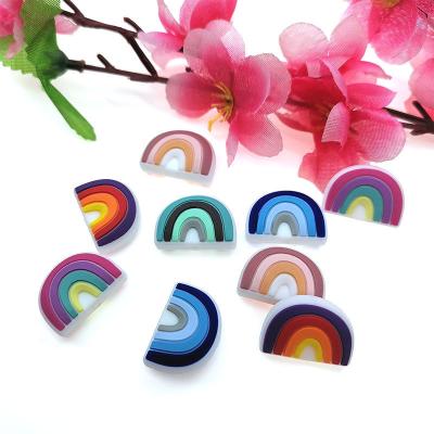 China Eco-friendly Hot selling items rainbow shape silicon teether food grade bpa free baby teething silicone teether for newborn for sale