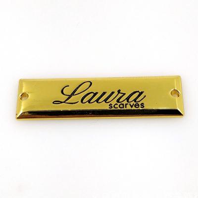 China Free sample factory supply washable metal label tag logo embossed metal labels for clothes and scarf for sale