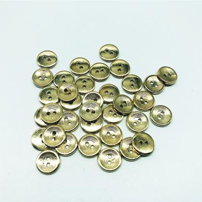 China Custom Metal 15mm New Design Viable Pastel Button Four Hole Sewing Shirt Buttons For Clothes for sale