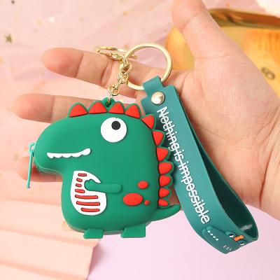 China Neutral/Men's and Women's Silicone Earphone Bag Cartoon Dinosaur Coin Purse Key Chain Bag Creative New Gift Wholesale for sale