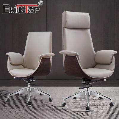 China Modern Style Manager Leather Office Chair With Wheels Ergonomic Drafting Chair for sale