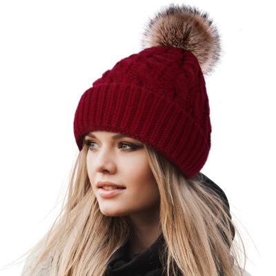 China Daily Life Women's Winter Soft Knit Beanie Hat With Faux Fur Pom Pom Warm Skull Cap Beanies For Women for sale