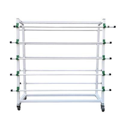 China Easy Installation High Quality White Double Sided Racks Show Hanging Textile Pipe Cloth Roll Floor Rack Cover Display Racks for sale