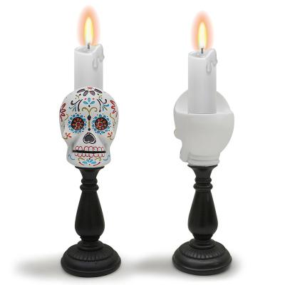 China Home Decoration Custom Luxury Resin Skulls Halloween Decorating Candle Holder Black Pillar Candlestick Wholesales Nordic Candle Stick Holder for sale