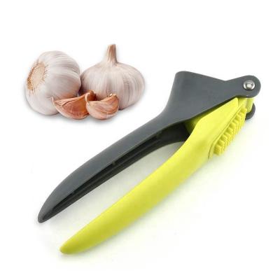 China Amazon Garlic Tool Crusher Stainless Steel Sustainable Garlic Press With PP Handle for sale