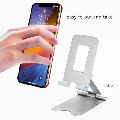 China Silicone Aluminum+ Foldable Plastic Phone Holder Table Desktop Mobile Phone Stand Adjustable Black Phone Stand for sale