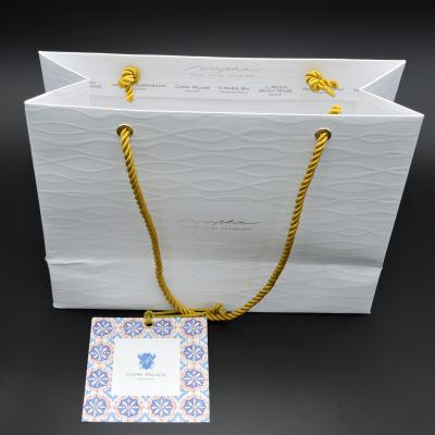 China Recyclable Luxury Customized Hotel Paper Bags Branded Paper Bag Clothes Packaging Paper Bags for sale