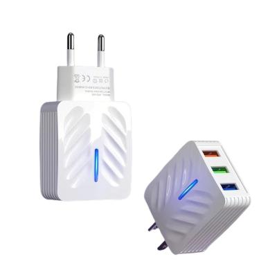 China European standard 3port mobile phone usb charger mobile phone fast charger led 5V2A power adapter 3U light multi left wall charger for sale