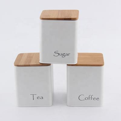 China Freshness Preservation Iron Canister Set 3 Pieces Storage Jars Set Storage Boxes Set With Bamboo Lids for sale