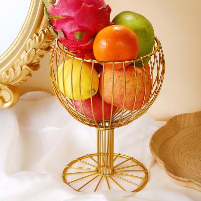 China Metal Fruit Basket Design Sense Cup Wire Iron Basket Simple Creative Decorative Fruit Storage Basket Bowl for sale