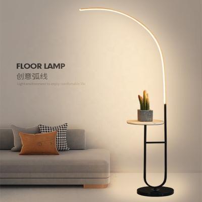 China Nordic modern LED floor lamp for the living room simple modern led bedside lamp for the bedroom study personality creative arc lamp for sale