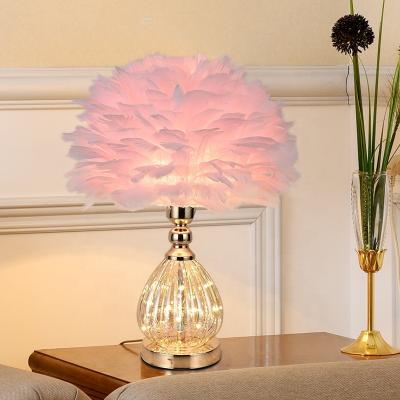 China Nordic simple modern creative pink glass table lamps LED feather table lamps for living room bedroom for sale