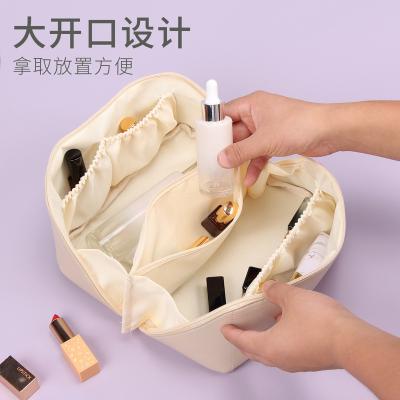 China New Arrival Fashion Travel Large Capacity Soft PU Cosmetic Bag Waterproof Toiletry Pouch For Women for sale