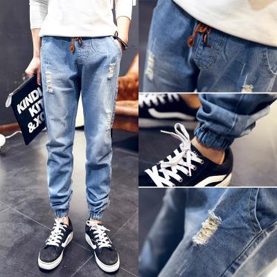 China Flared Cut Frayed Mens Super Skinny Jeans With Five Pockets Light Blue for sale