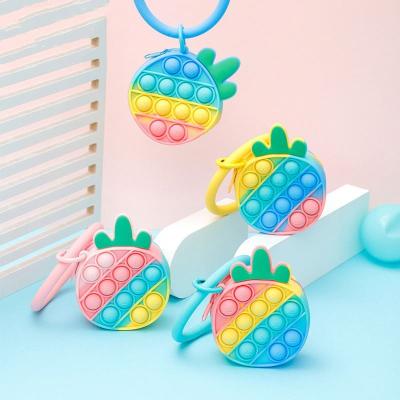 China 2022 hot selling fashion cute coin purse silicone rainbow pineapple push bubble zipper fidgety person sensory toys for kids handbag for sale