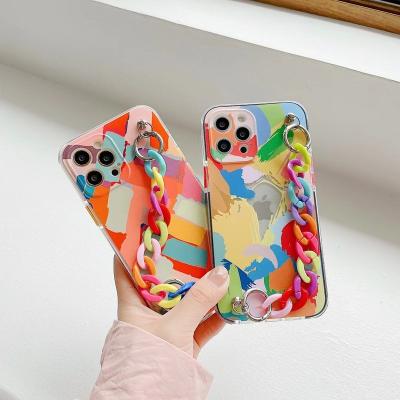 China For iphone 12 pro max case for girls graffiti flower pattern bracelet chain wrist strap luxury phone case for iphone 11 max transparent tpu cover 12 pro 8 7 6 for sale