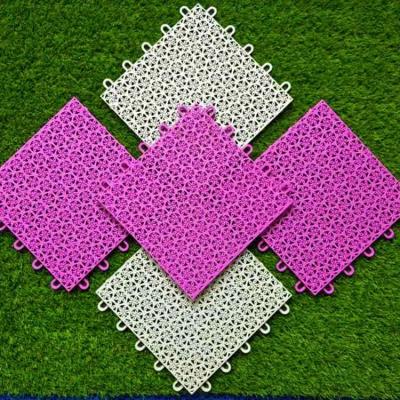 China Redbud Outdoor Removable Hard Outdoor Pattern PP Interlocking Carpet Plastic Floorring Tile , Kids Plastic Floor Mat for sale