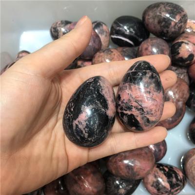 China Natural Polished Crystal Yoni Eggs China Rose Rhodonite Eggs Quartz Stone Eggs for sale