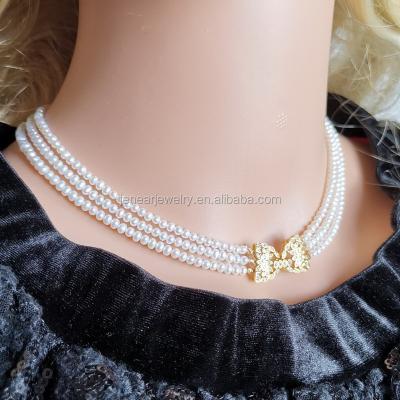 China Royal Freshwater Pearl Necklace CLASSIC Triple Layered Luxury Mini Natural Pearl Necklace With Gold Flower Clasp for sale