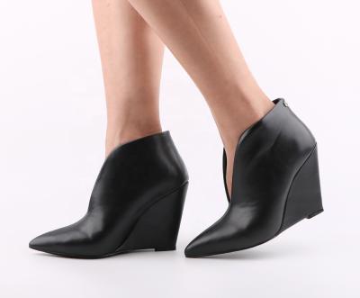 China Hot Selling Deodorization Ladies Relieve Ankle Boots Women Fashion Wedge Heel Fancy Leather Elegant Shoes For Women for sale