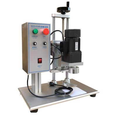 China DDX-450 semi-automatic plastic beverage bottle screw capping machine for sale