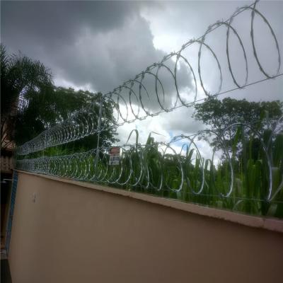 China Barbed Wire Razor Coil Anti-Corrosion Wire Fence Single Or Cross Razor Barrier for sale