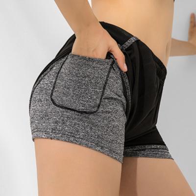 China Breathable Pocket Shorts Breathable Hidden Workout Shorts Women Jogging Shorts Women for sale