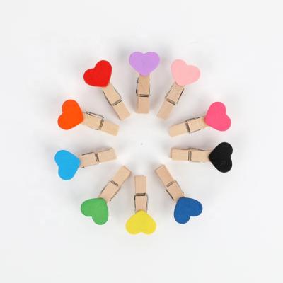 China New Design Mini Heart Shaped Wooden Clothespins from Europe Colored Craft Clips with Jute Twine for Wedding Party Decoration for sale