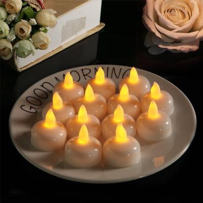 China Romantic Waterproof Tea Light Flameless Candles Lights Electronic Night Light LED Float Candlestick For Wedding Decoration Party for sale