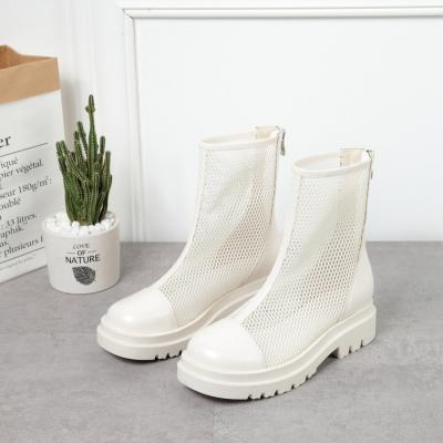 China Height Increasing Women Round Toe Preppy Short PU Boots School Cut Out Women Flat Slip On Boots for sale