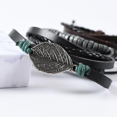 China Hot Selling PU Rope Leather Street Punk Multilayer Leaf Bracelet Men And Women Retro Beat The Ethnic Style Accessories for sale