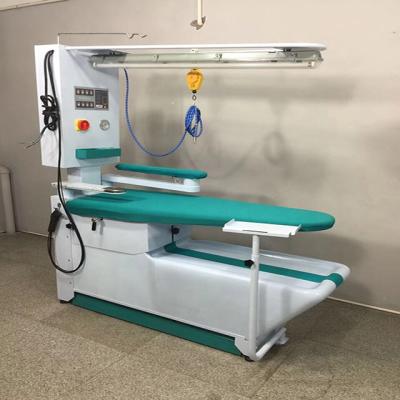 China Other Industrial Commercial Laundry Steam Vacuum Ironing Table for sale