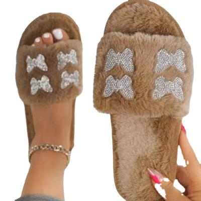 China CUSHIONING 2021 new faux fur faux fur faux stone large size bowknot line one thick-based fur slippers for sale