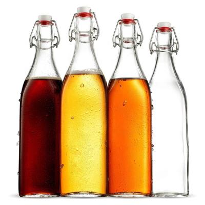 China Viable Empty Swing Flip Top Glass Beer Bottle 250ml 350ml 500ml 750ml 1000ml Milk Bottle for sale