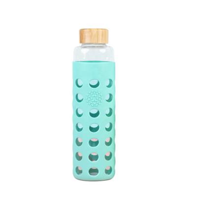 China Sustainable Borosilicate 420ml Single Wall Glass Water Bottle With Silicone for sale