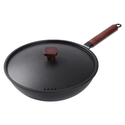 China Compatible 32cm Kitchen Beech Cast Iron Wok Non-Stick Induction Pans Sustainable Handle With Lid Cookware for sale