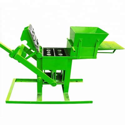 China Manual compressed earth SHM2-40 interlocking brick making machine Te koop