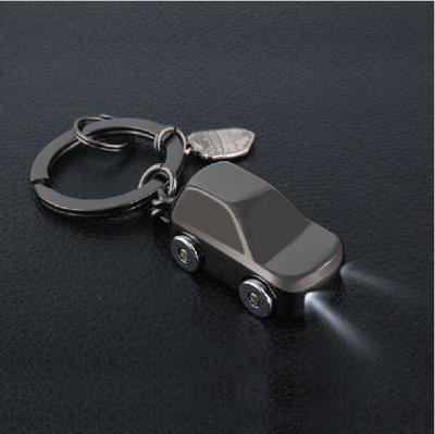 China Simple Car Shape Metal Metal Key Chain For Man With Light for sale