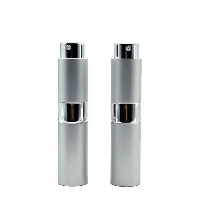 China Cosmetic Round 10ml 15ml Twist Up Metal Spray 8ml Aluminium Portable Refillable Perfume Atomizer Bottle for sale