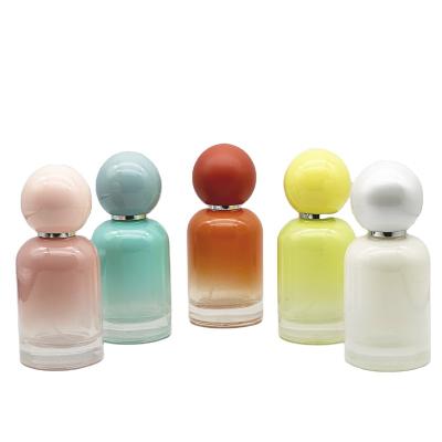 China Cosmetic Colorful 30ML round spray color empty perfume bottle with round cap for sale