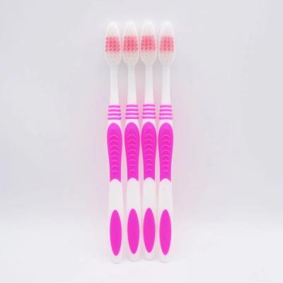 China OEM Reusable Wholesale Toothbrush Two Color Stiffen Rubber Covered Handle Tongue Cleaning Adult Toothbrush for sale