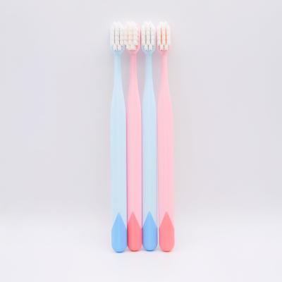 China Light Blue Macaron Pink Color Toothbrush Fairshaped Handle Tooth Whitening Home Use Cheap Toothbrush for sale