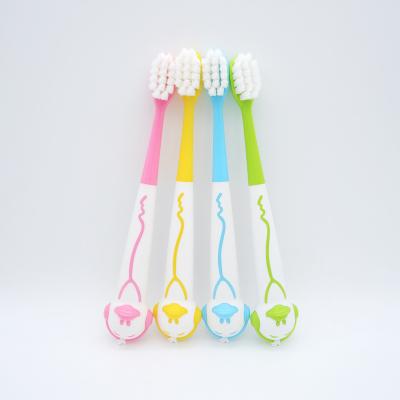 China For Home Use Small Size Cute Handle Sells Wholesale Soft Rubber Coated Children Toothbrush PBT Bristle Cartoon Duck Shaped Children Toothbrush for sale