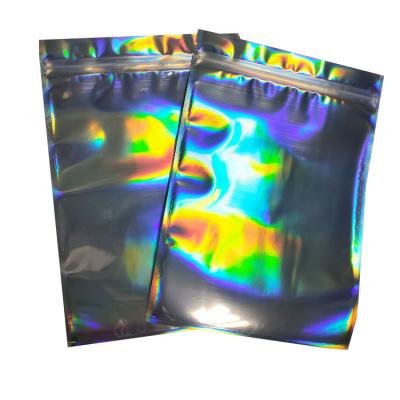 China Transparent Clear Front Barrier Silver Backed Mylar Bag Plastic Packaging Holographic Ziplock for sale